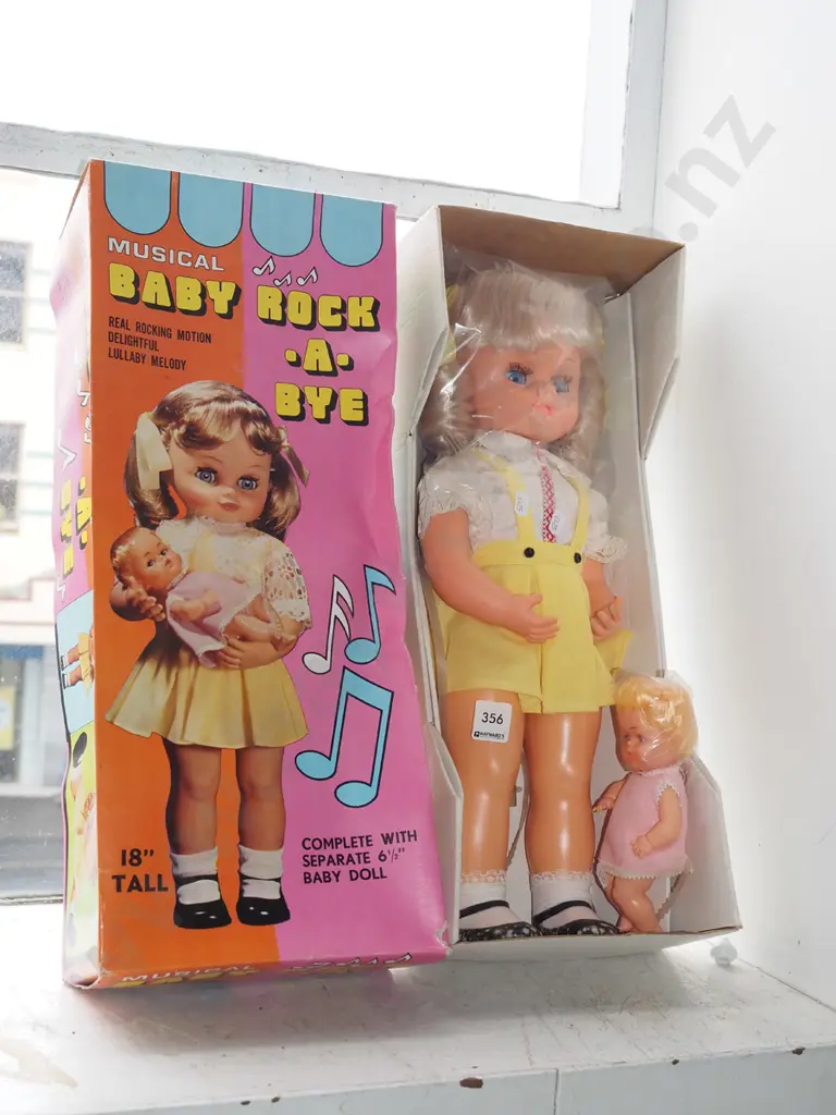 boxed; Musical Rock A Bye doll - damage to box Image 1++