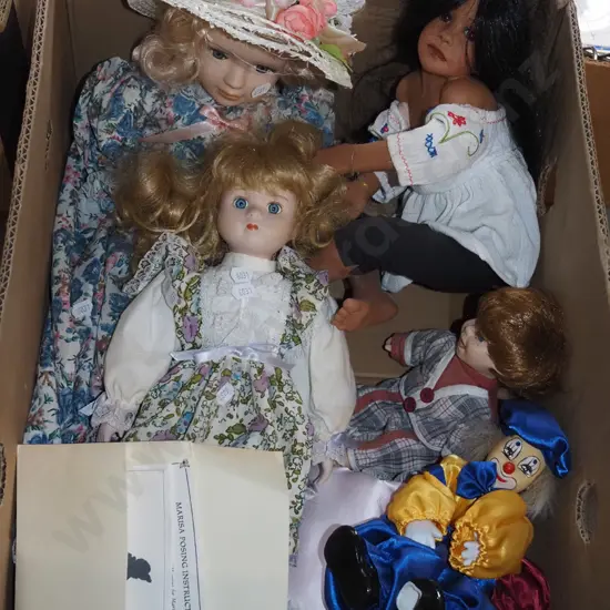 box; various dolls