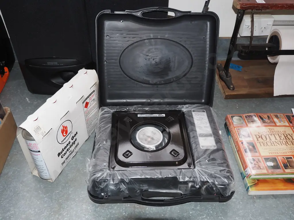 portable camping stove and gas cartridges Image 1++