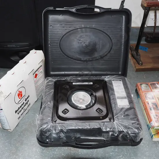 portable camping stove and gas cartridges