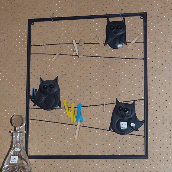 metal owl themed notice board