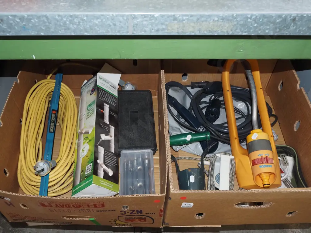 2x boxes; extension cord, rain water collector, garden sprinkler, travel iron etc Image 1++