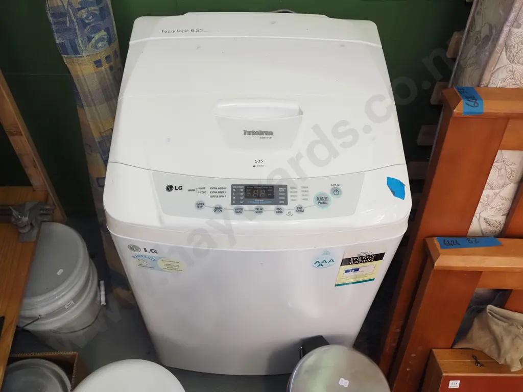 LG Fuzzy Logic top load washing machine Image 1++