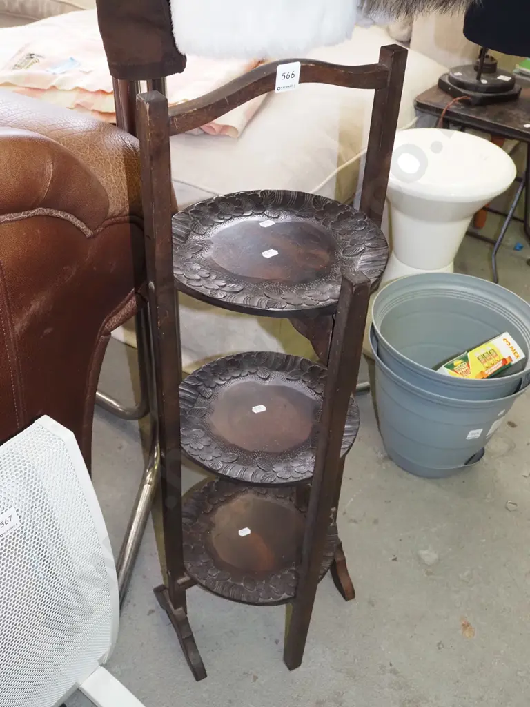 carved wooden foldaway 3 tier plate stand - has had repair Image 1++