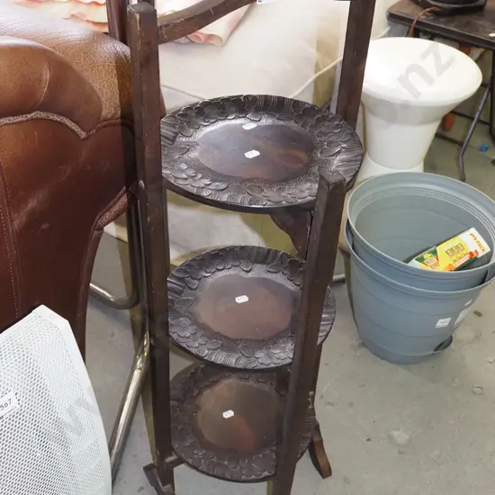 carved wooden foldaway 3 tier plate stand - has had repair