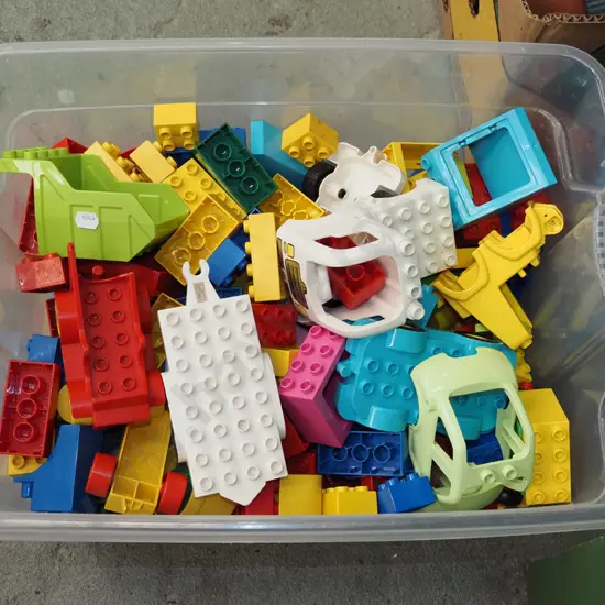 plastic tub of Duplo blocks