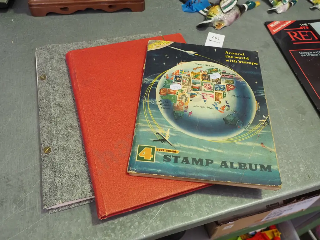 3x stamp albums Image 1++
