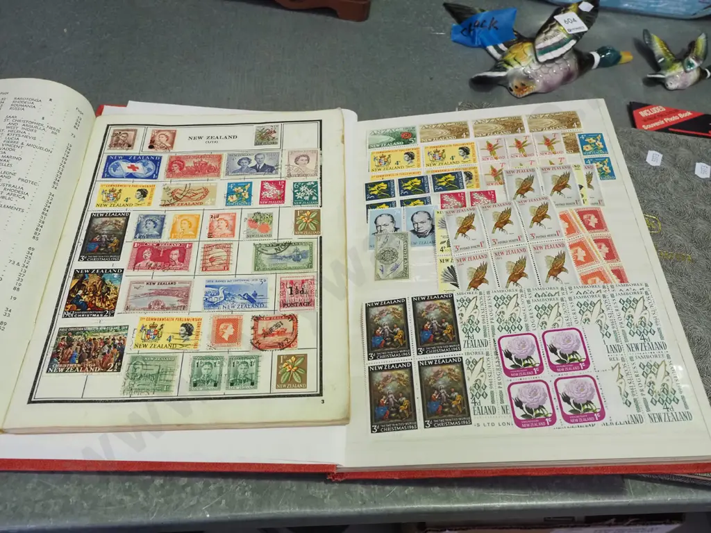 3x stamp albums Image 1++