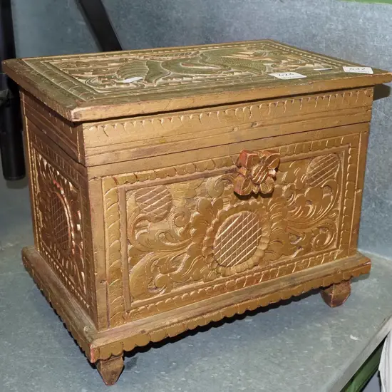 heavily carved wooden lidded box H250 W300 D200