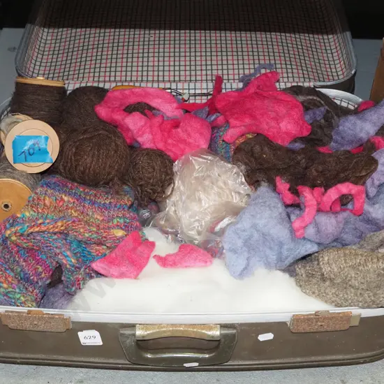 suitcase; wool etc