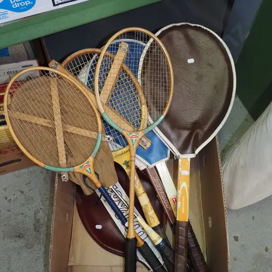 box of vintage rackets