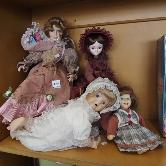 assorted porcelain dolls