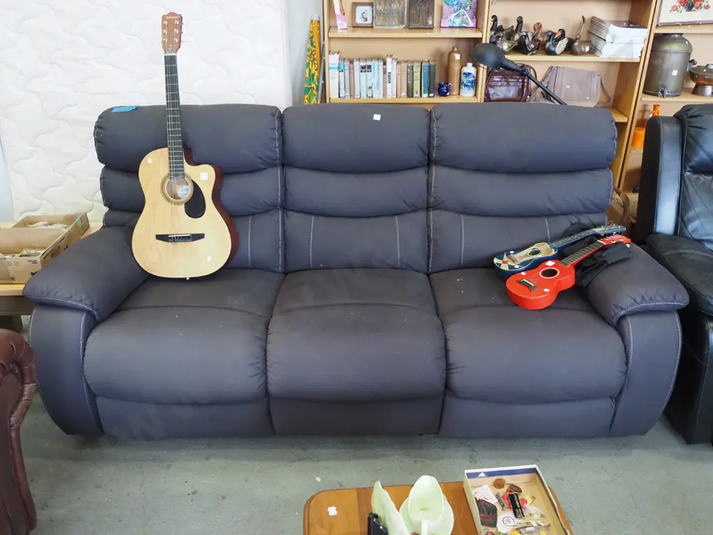 grey 3 seater settee with reclining sections at each end Image 1++