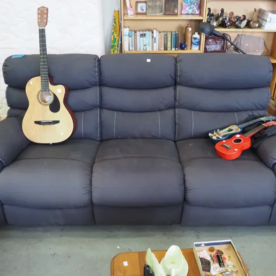 grey 3 seater settee with reclining sections at each end