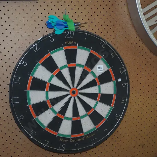 dart board and darts