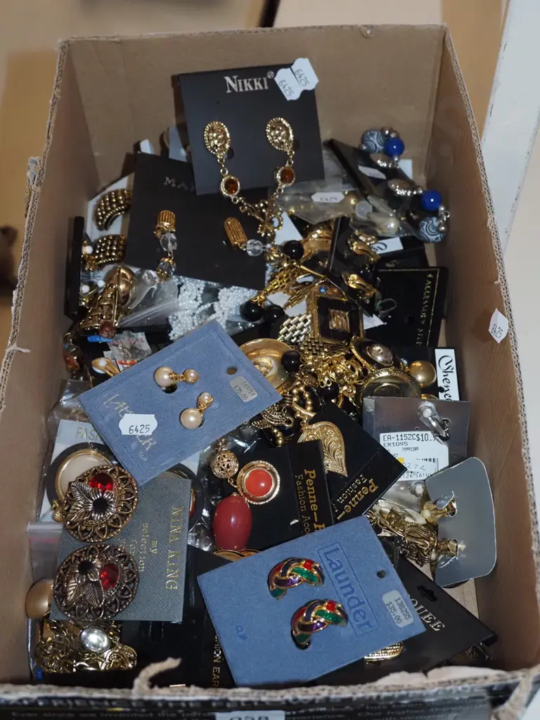 box of costume clip on earrings Image 1++