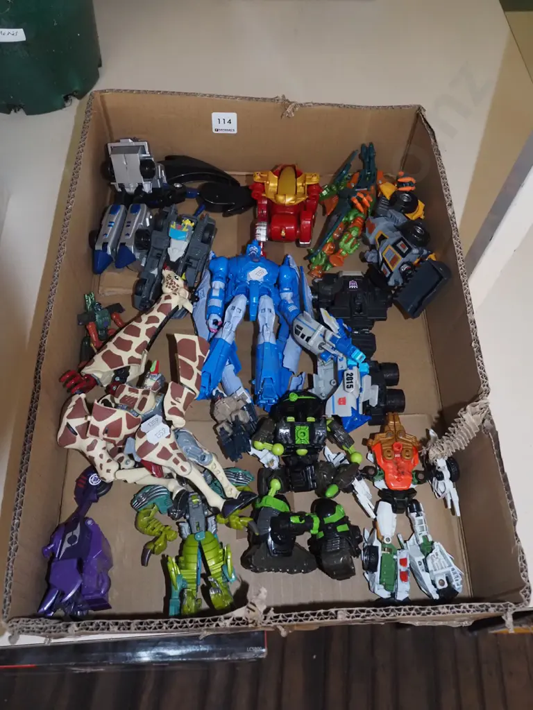 box of plastic transformer toys Image 1++