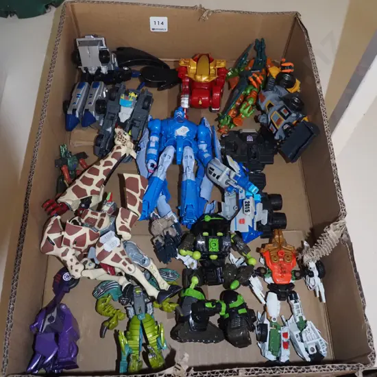 box of plastic transformer toys