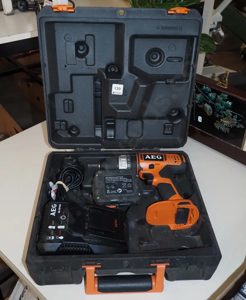 AEG 14.4V battery powered drill, 1x battery; charger - battery in office Image 1++