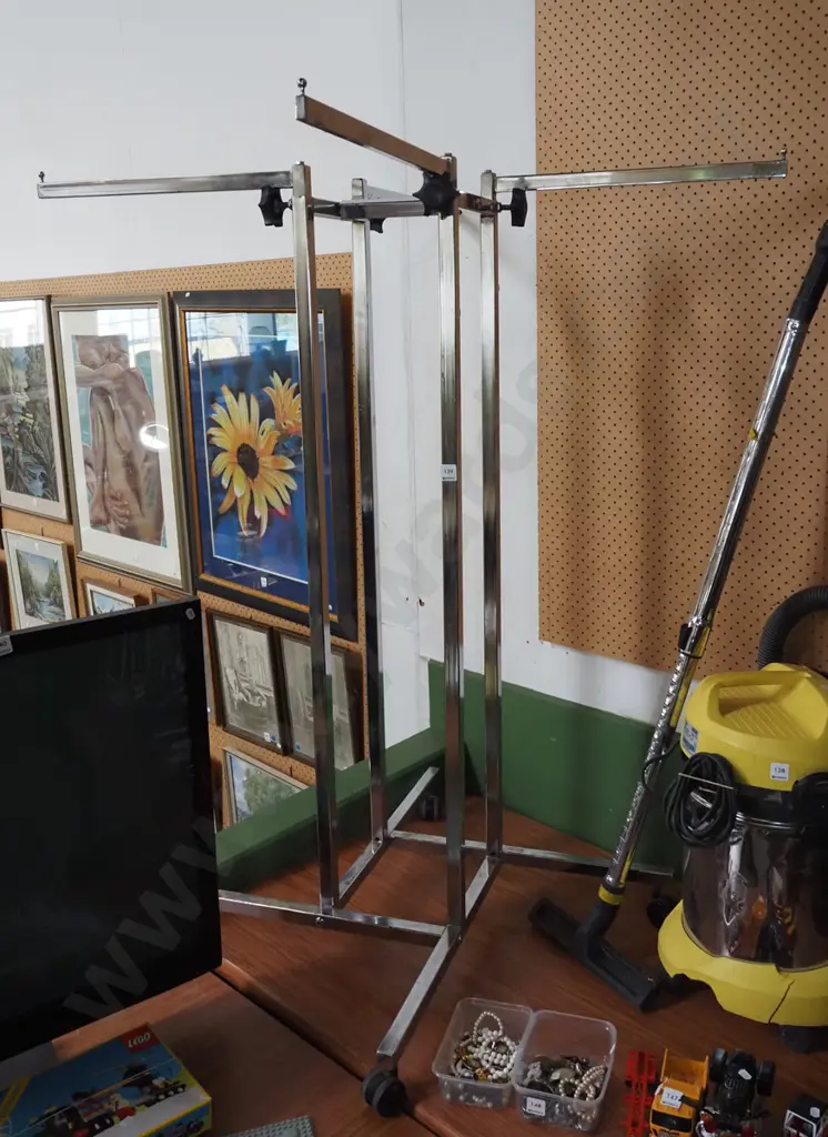 chrome shop clothing display stand with adjustable heights Image 1++