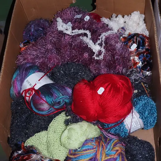 box of knitting yarns