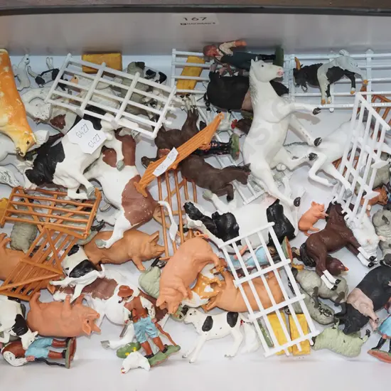 box of plastic farm animals