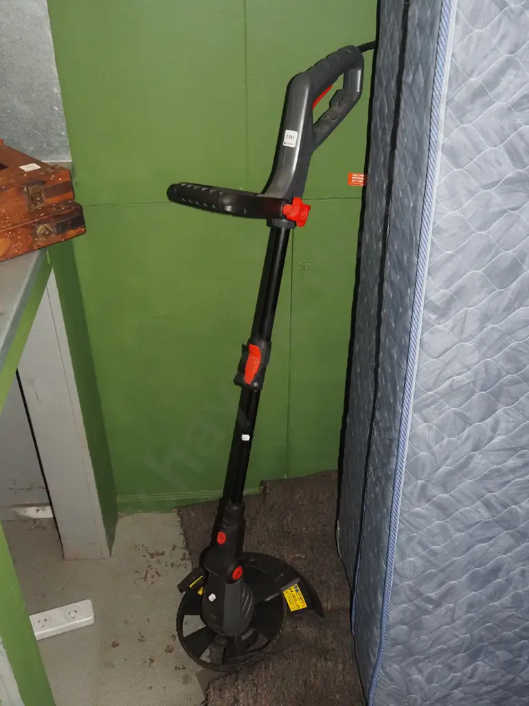 Ozito corded line trimmer Image 1++
