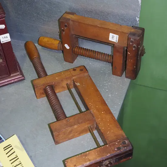 pair of vintage wooden clamps - some borer