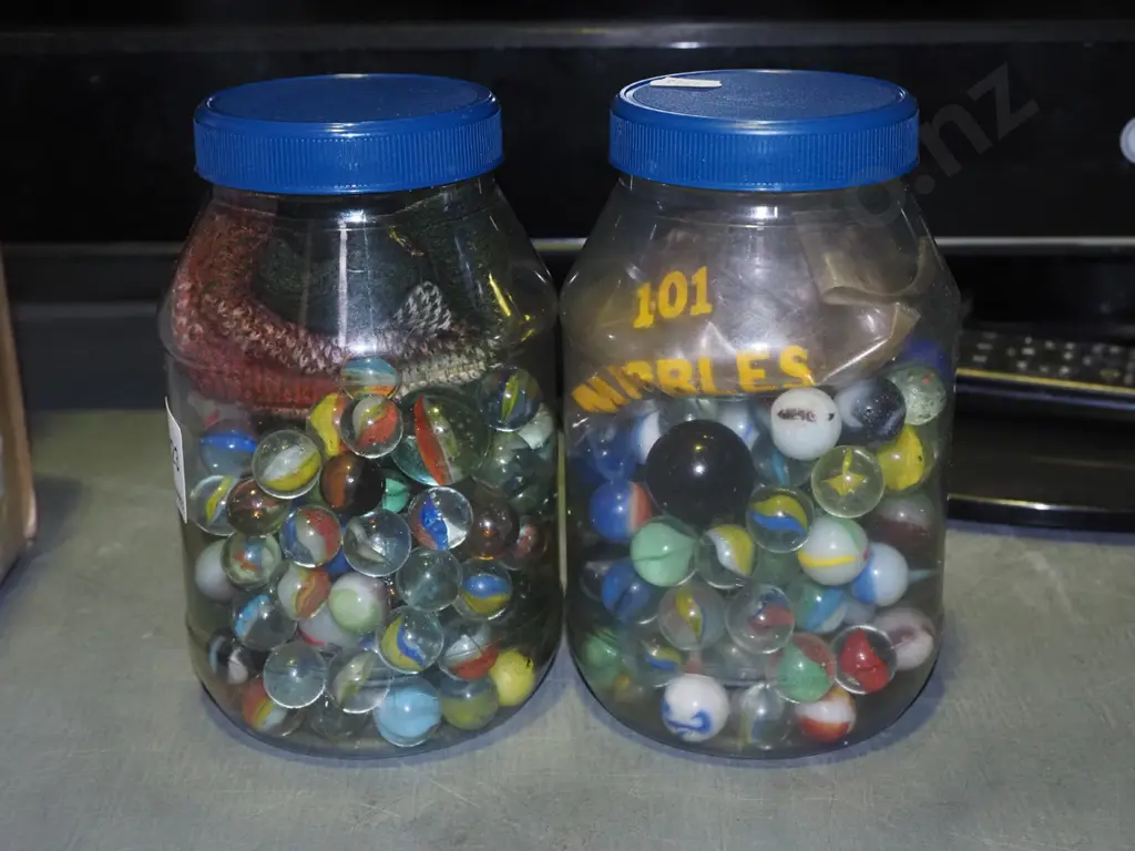 2x plastic containers of marbles Image 1++