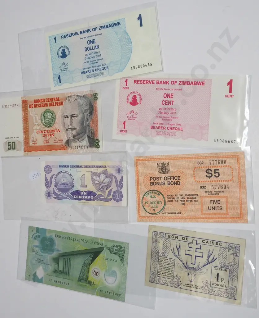 tray; various bank notes, post office bonds Image 1++