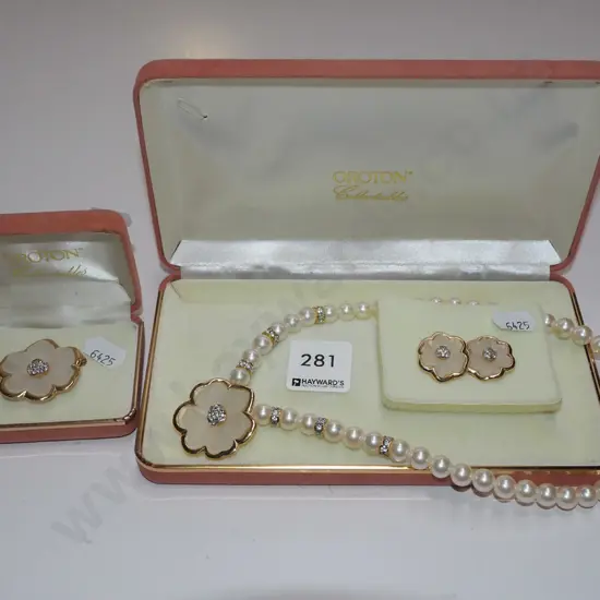 matching necklace, earrings and brooch sets