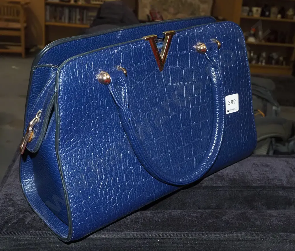 blue leather hand bag Image 1++