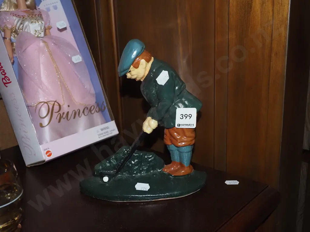 cast iron golfing figurine H190 Image 1++
