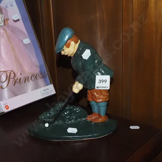 cast iron golfing figurine H190