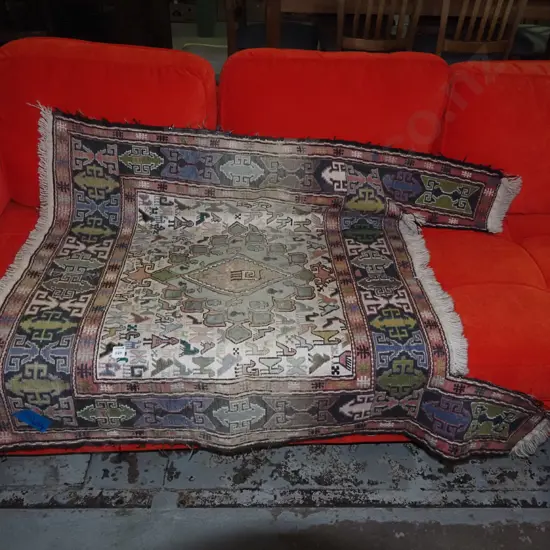 faded Turkish hand knotted floor rug with unusual cut out shapes