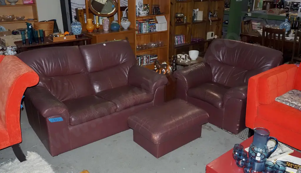 1980s burgundy 3 piece leather lounge suite - 2 seater, single and footstool Image 1++