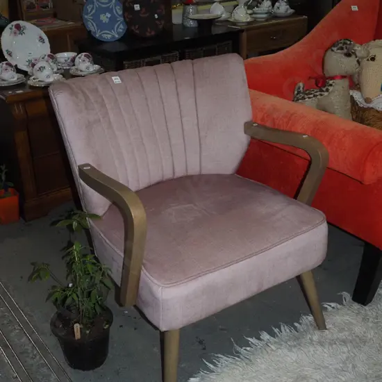 fawn upholstered armchair