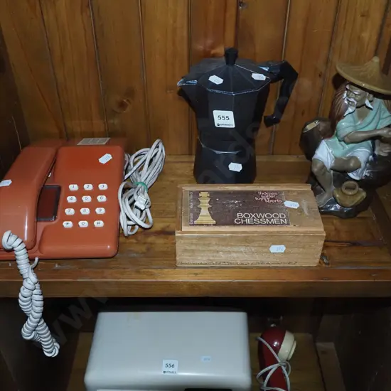 shelf; chess pieces, mud figurine, espresso maker etc