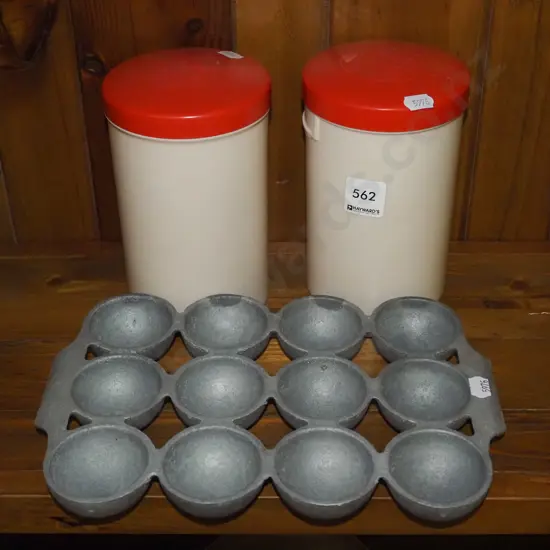 2x plastic Tiger Tea tins, gem iron