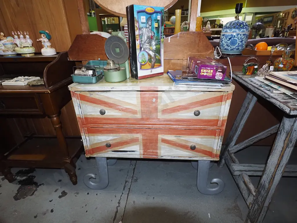 unusual hand painted 2 door chest with curved metal feet and Union Jack on front Image 1++