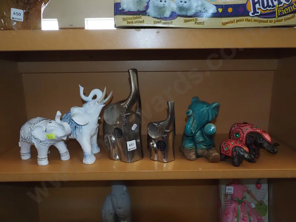 shelf of elephant figurines H240 Image 1++