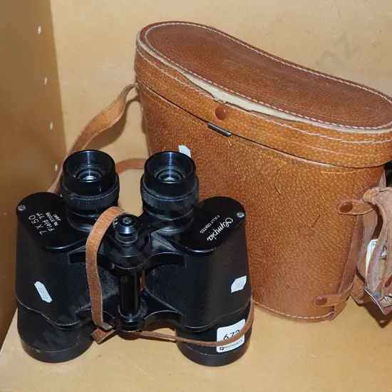 pair of 7x50 leather cased binoculars