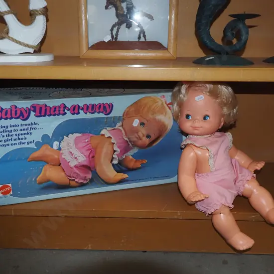boxed Baby That A Way doll - some staining to doll's clothes