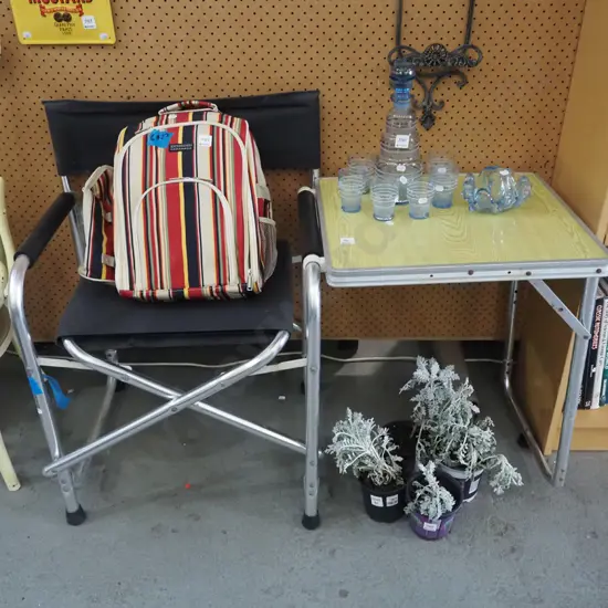 folding camping chair with latch on table