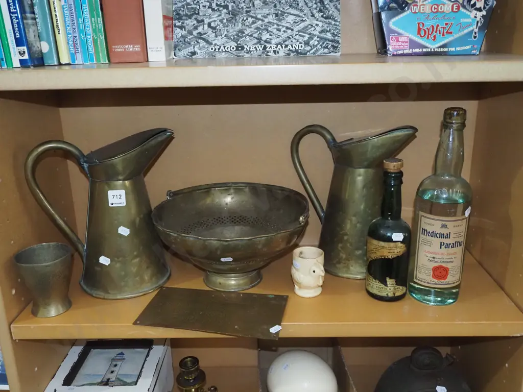 shelf; brass water jugs, parafin bottles etc Image 1++