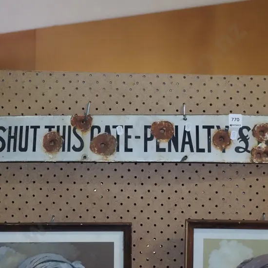 enamel Shut This Gate sign wth bullet holes