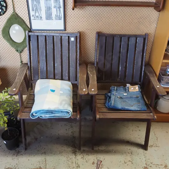 2x wooden outdoor armchairs