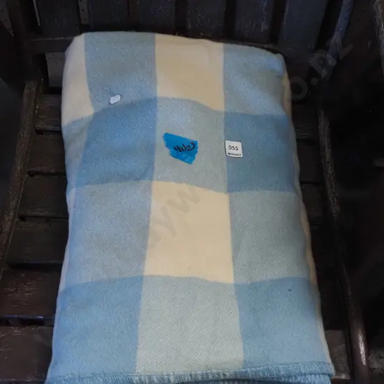 blue and white checked woollen blanket