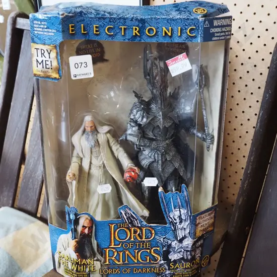 boxed Lord of the Rings figurines - Sauron and Saruman - damage