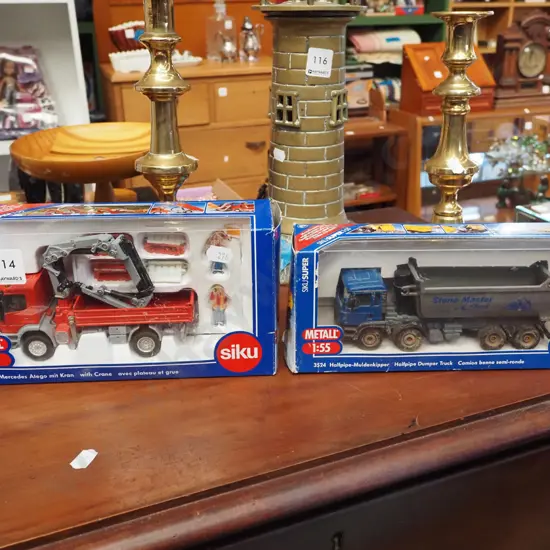 2x boxed diecast scale model vehicles